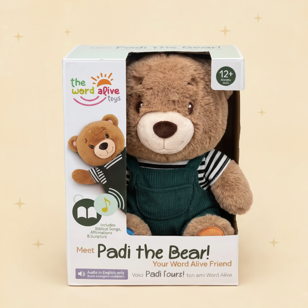 The Word Alive Toys Padi the Bear Christian plush toy in its retail packaging, featuring a brown teddy bear wearing a green overall-style dress and striped shirt, with product branding and age information visible on the box.